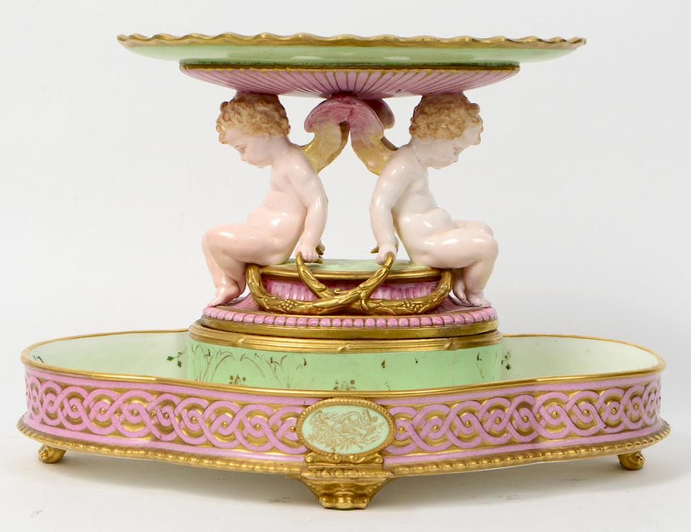 Appraisal: CONTINENTAL ENAMELED GILT PORCELAIN CENTERPIECE Late th Century The underside