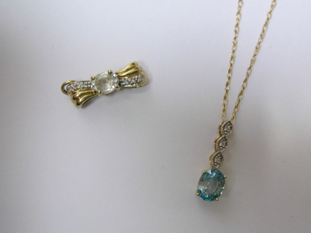 Appraisal: Lot comprising ct gold blue topaz and diamond set pendant