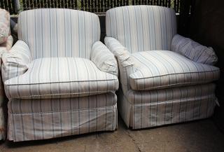 Appraisal: lot of Moderne custom loose cushion armchairs with ottomans covered