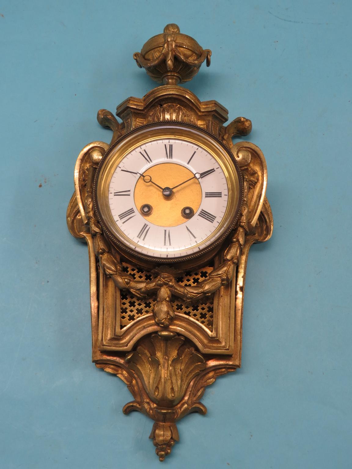 Appraisal: A late th century French ormolu cartel clock enamelled dial