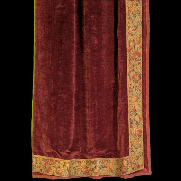 Appraisal: ARTS CRAFTS TEXTILES Four burgundy velvet curtains with floral tapestry