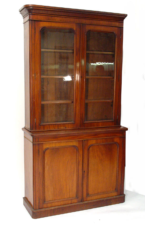 Appraisal: Victorian mahogany bookcase the moulded cornice above a pair of