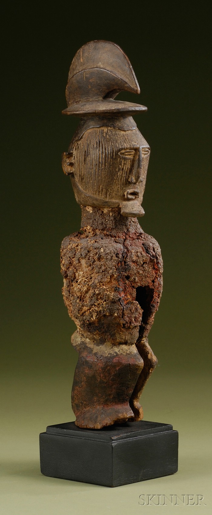 Appraisal: African Carved Wood Power Figure Teke standing with bent knees