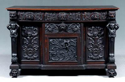 Appraisal: Renaissance Revival sideboard three board top highly carved oak with