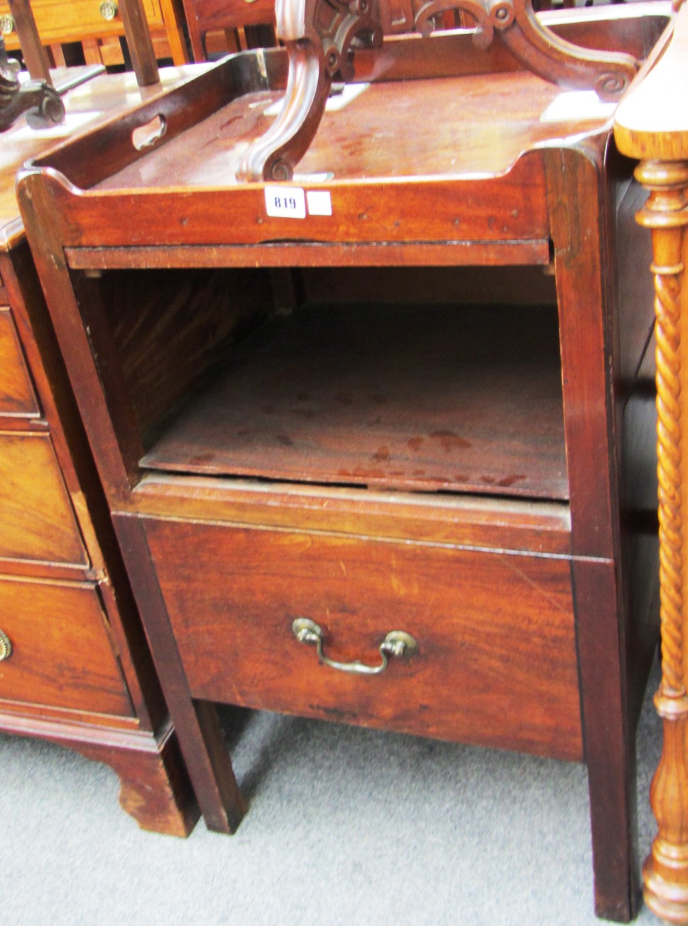 Appraisal: A Geroge III mahogany tray top commode with cupboard over