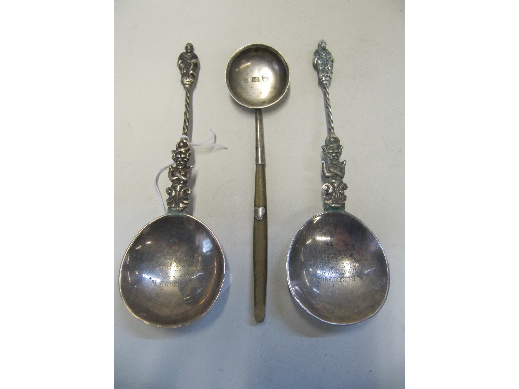 Appraisal: Lot comprising pair of silver serving spoons London and a