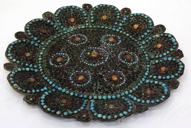 Appraisal: A MIDDLE EASTERN BRASS DISH decorated with turquoise cabouchons and