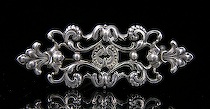 Appraisal: th Century Tiffany Co Sterling Pin Overall pierced design with