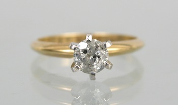 Appraisal: A Ladies' Solitaire Diamond Ring k yellow and white gold