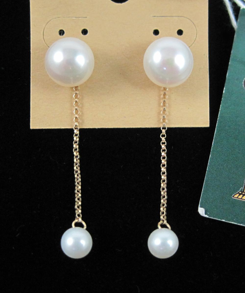 Appraisal: PAIR OF PEARL AND FOURTEEN KARAT GOLD EAR STUDS WITH