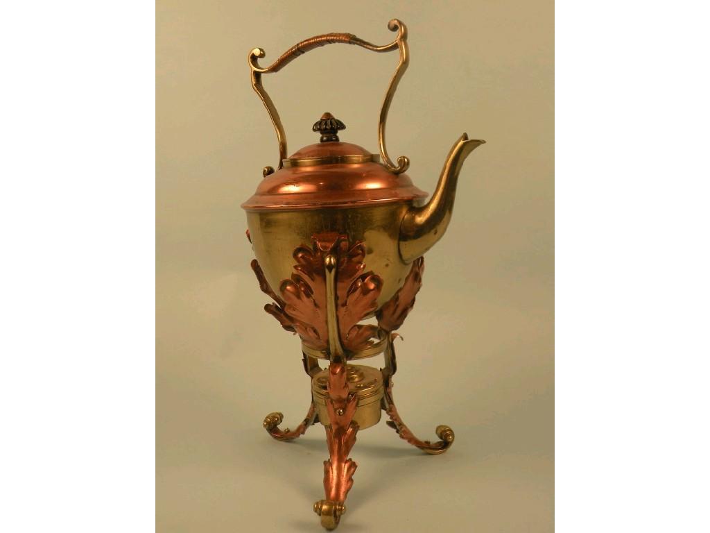 Appraisal: An Arts Crafts style copper and brass tea kettle and