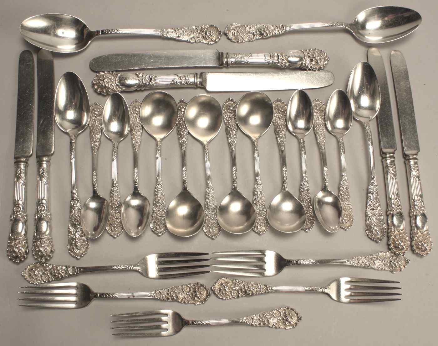 Appraisal: REED BARTON STERLING SILVER PARTIAL FLATWARE SETIn the Trajan'' pattern