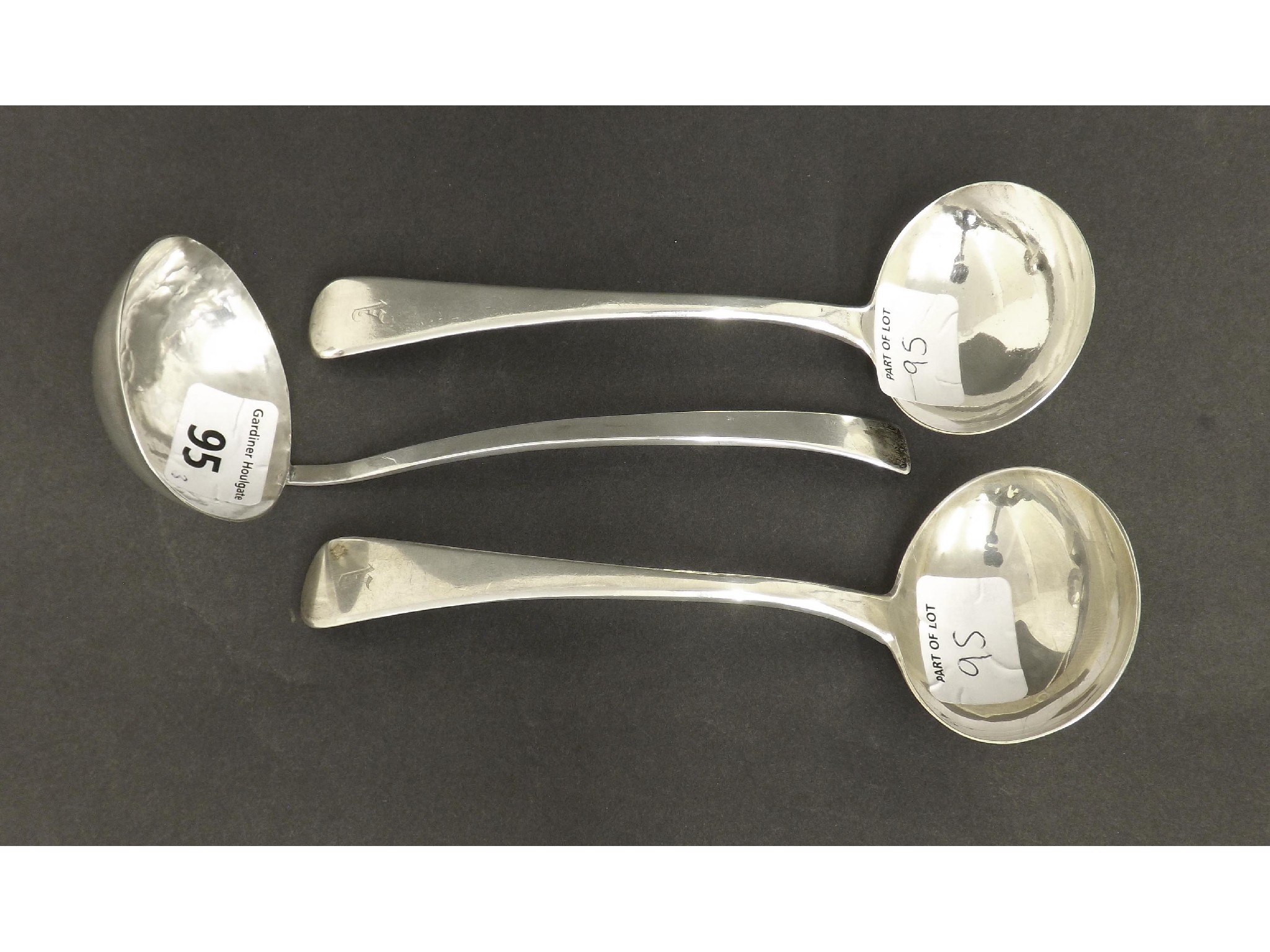 Appraisal: Two similar late George IV silver sauce ladles maker RC