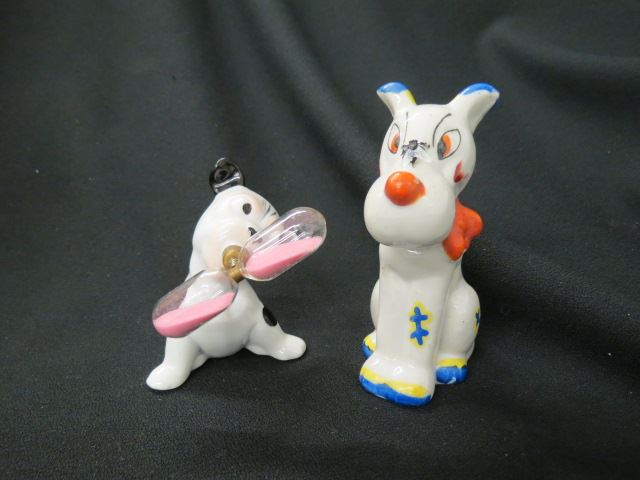 Appraisal: Comical Porcelain Dog Figurines puppy hour glass timer and dog