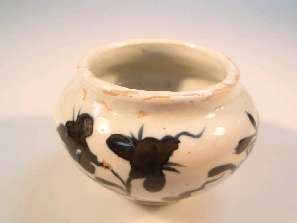 Appraisal: A Chinese Ming Dynasty small ovoid bowl heavily potted with