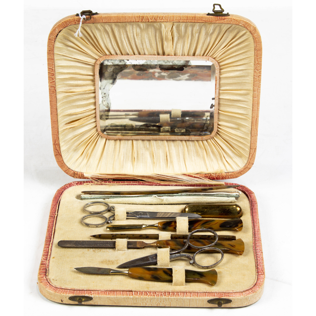 Appraisal: VINTAGE MANICURE SET IN EMBOSSED CASE Manicure set in embossed