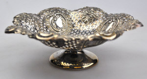 Appraisal: A late Victorian embossed and pierced silver bonbon dish on