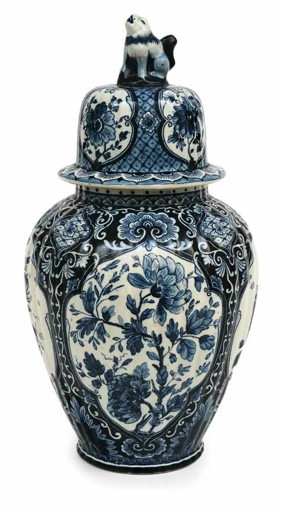 Appraisal: A blue and white Delft Chinoiserie vase with cover The