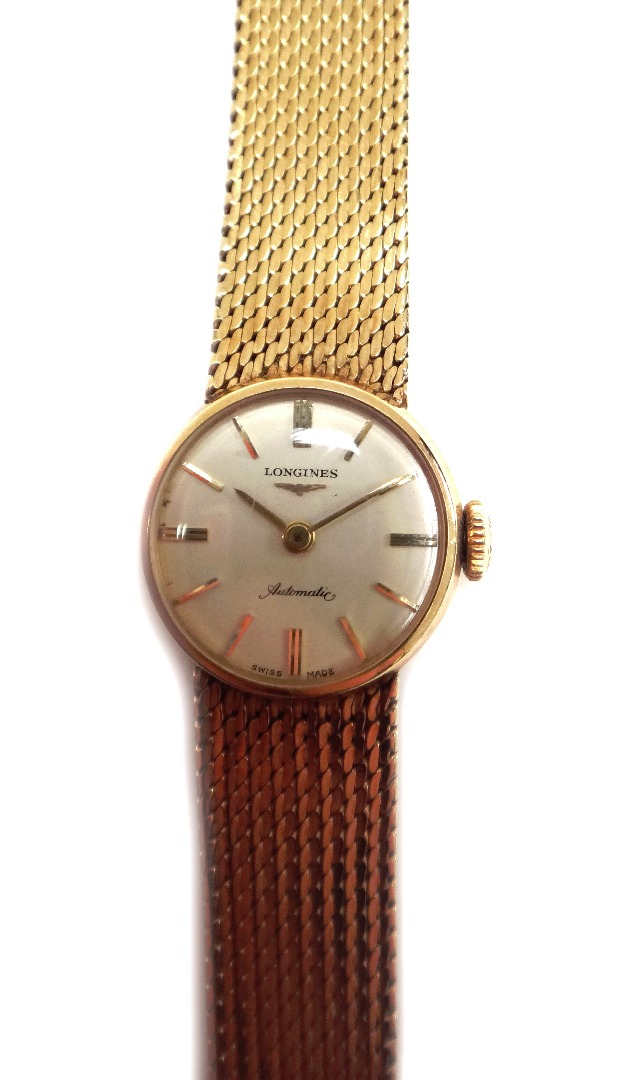 Appraisal: A lady's ct gold Longines Automatic bracelet wristwatch the signed