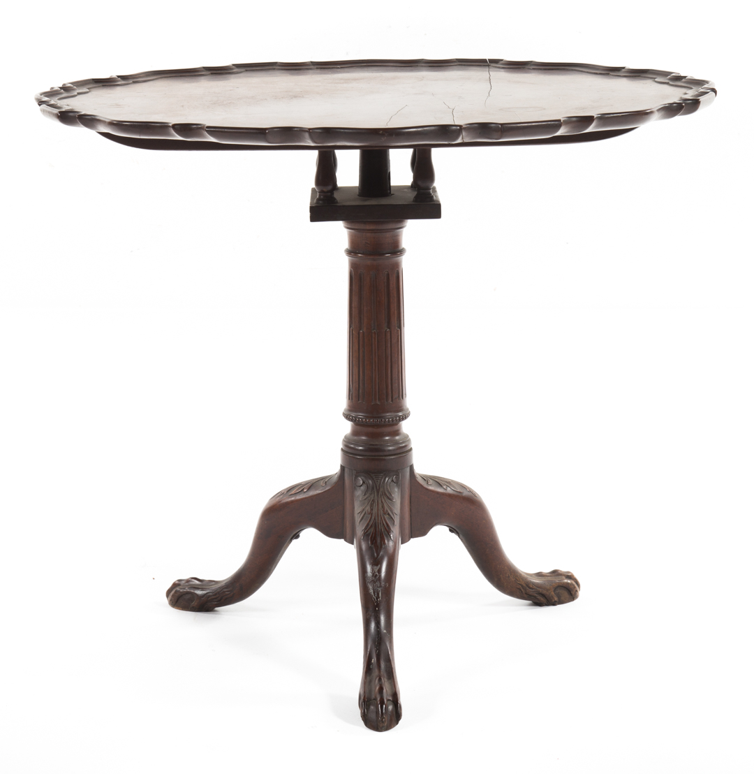 Appraisal: Chippendale style mahogany tilt top tea table in round tilt