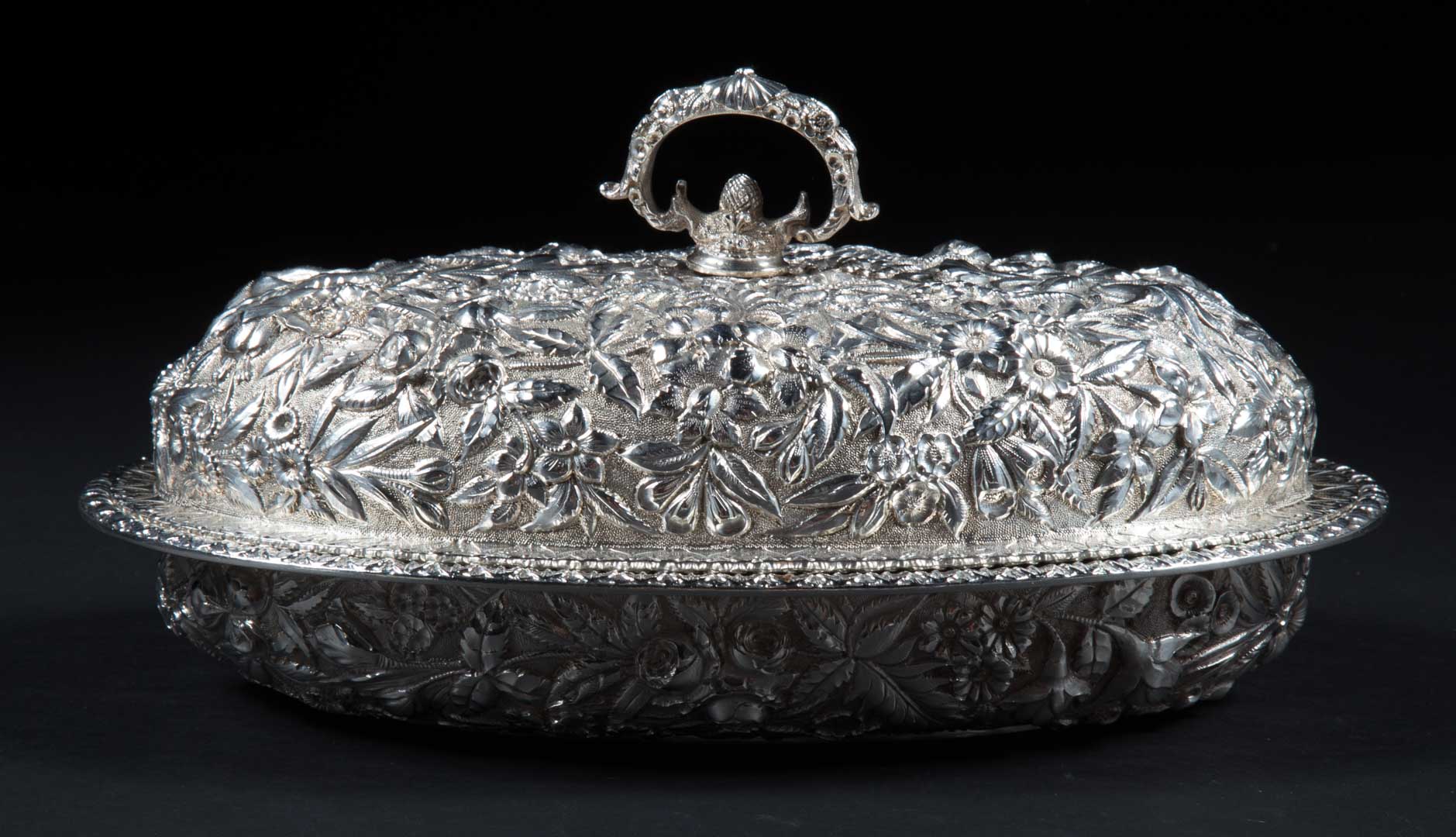 Appraisal: Kirk repousse sterling covered vegetable dish in H x in