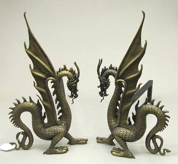 Appraisal: A pair of Chinese cast brass andirons of dragons late