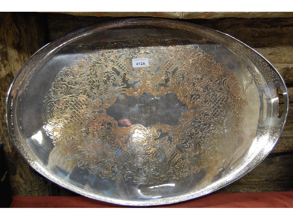 Appraisal: Oval silver plate pierced gallery tray on four bun feet