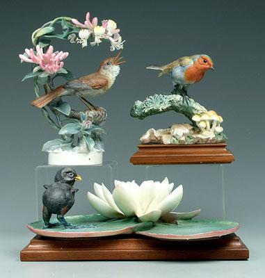 Appraisal: Three Doughty bird figurines nightingale and honeysuckle in one stamen