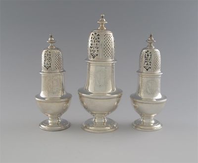 Appraisal: A suite of three George II vase-shaped casters one large