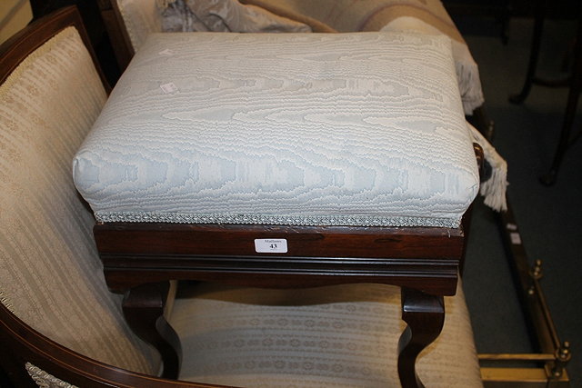 Appraisal: AN EDWARDIAN ROSEWOOD PIANO STOOL with rectangular upholstered seat and