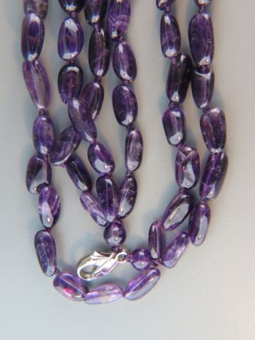 Appraisal: Amethyst Necklace triple strand of natural beads long sterling clasp