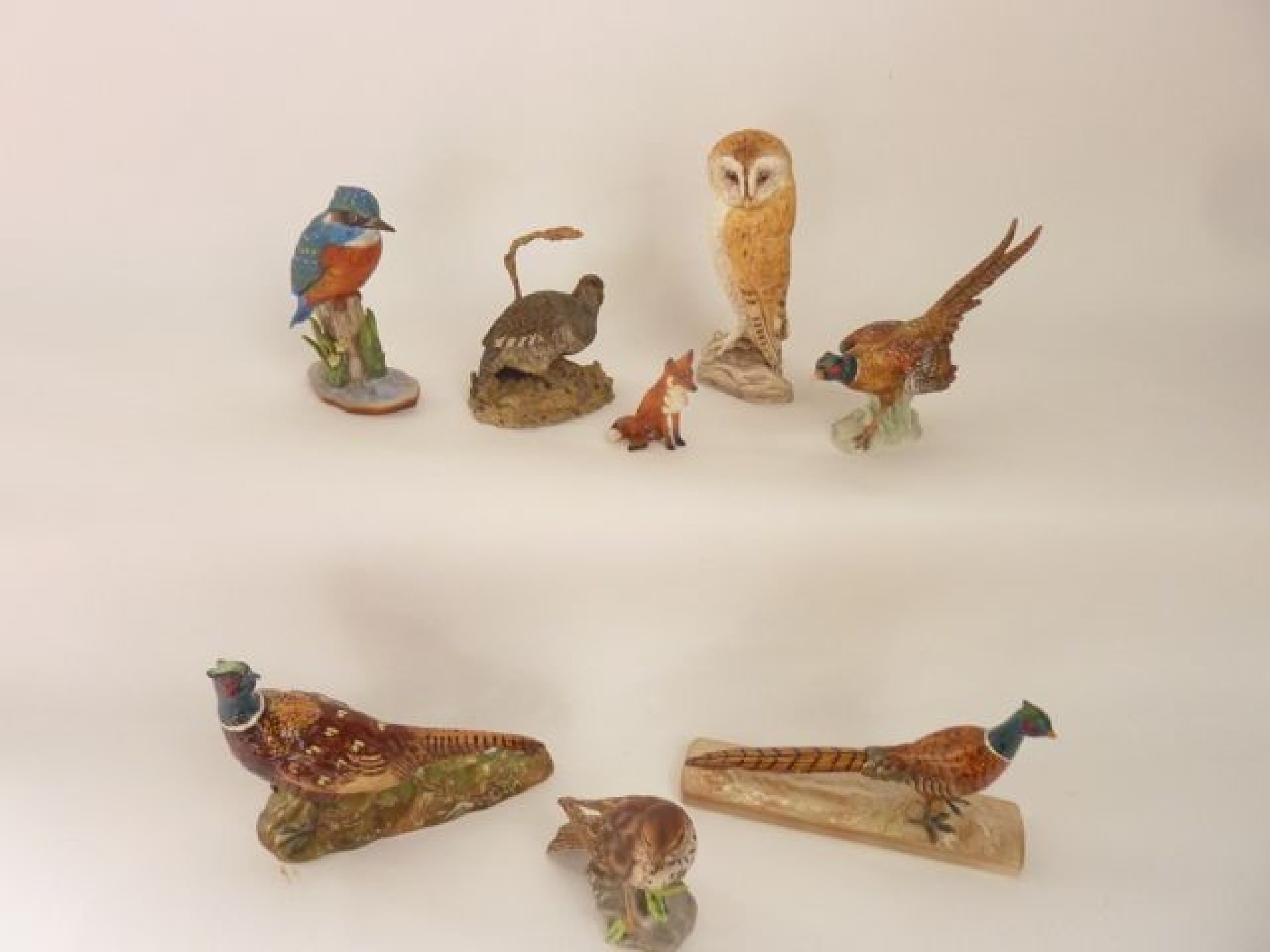 Appraisal: A collection of ceramic animals and birds including a Beswick