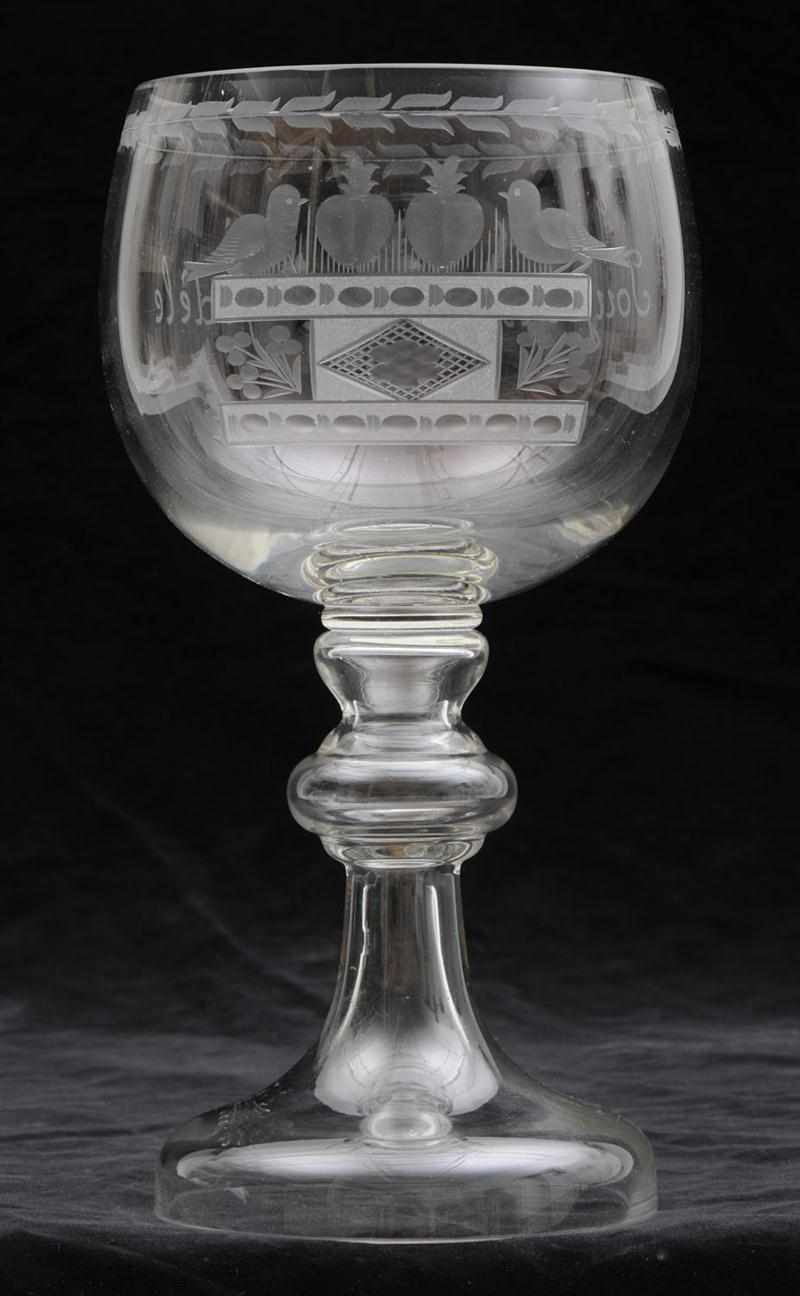 Appraisal: FRENCH ENGRAVED GLASS GOBLET With a flamming heart within crossed