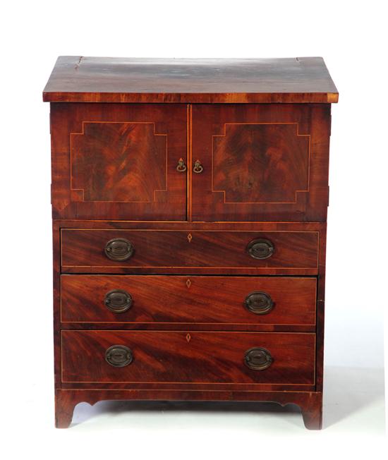 Appraisal: DIMINUTIVE REGENCY CABINET England early th century figured veneer oak