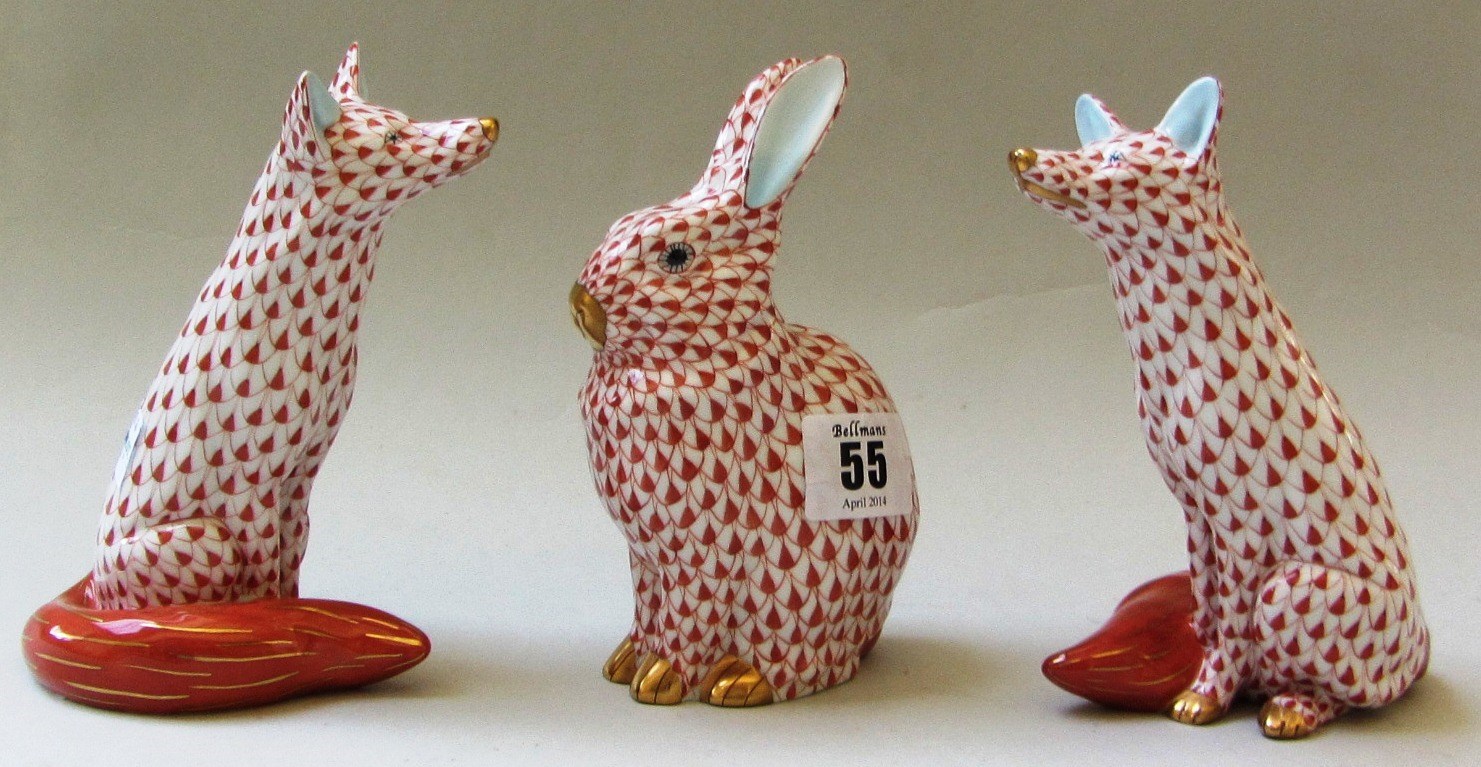 Appraisal: Two Herend porcelain foxes each decorated in a red and