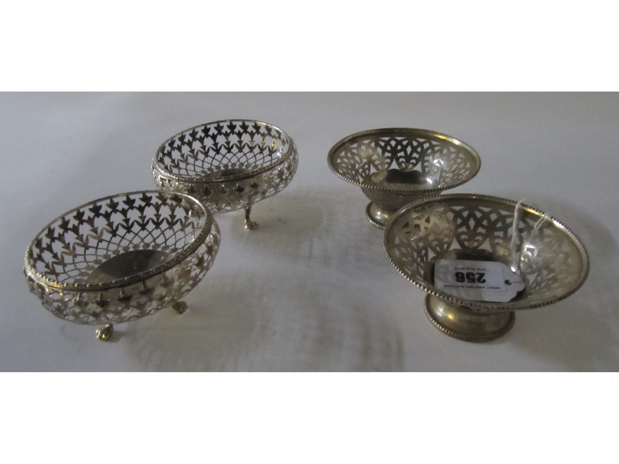 Appraisal: A lot comprising two pairs of silver bon bon dishes