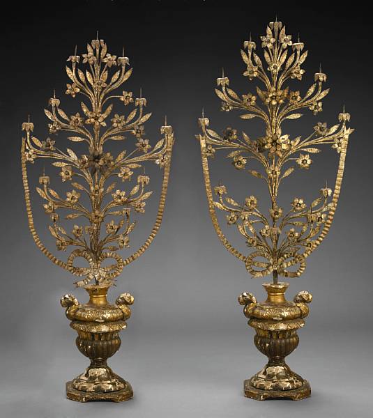 Appraisal: A pair of Italian parcel gilt twelve light candelabra th