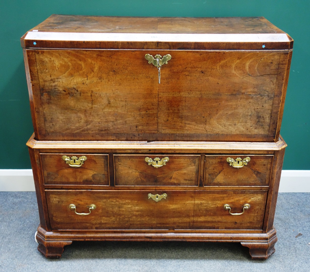 Appraisal: A George III mahogany banded walnut rectangular lift top chest