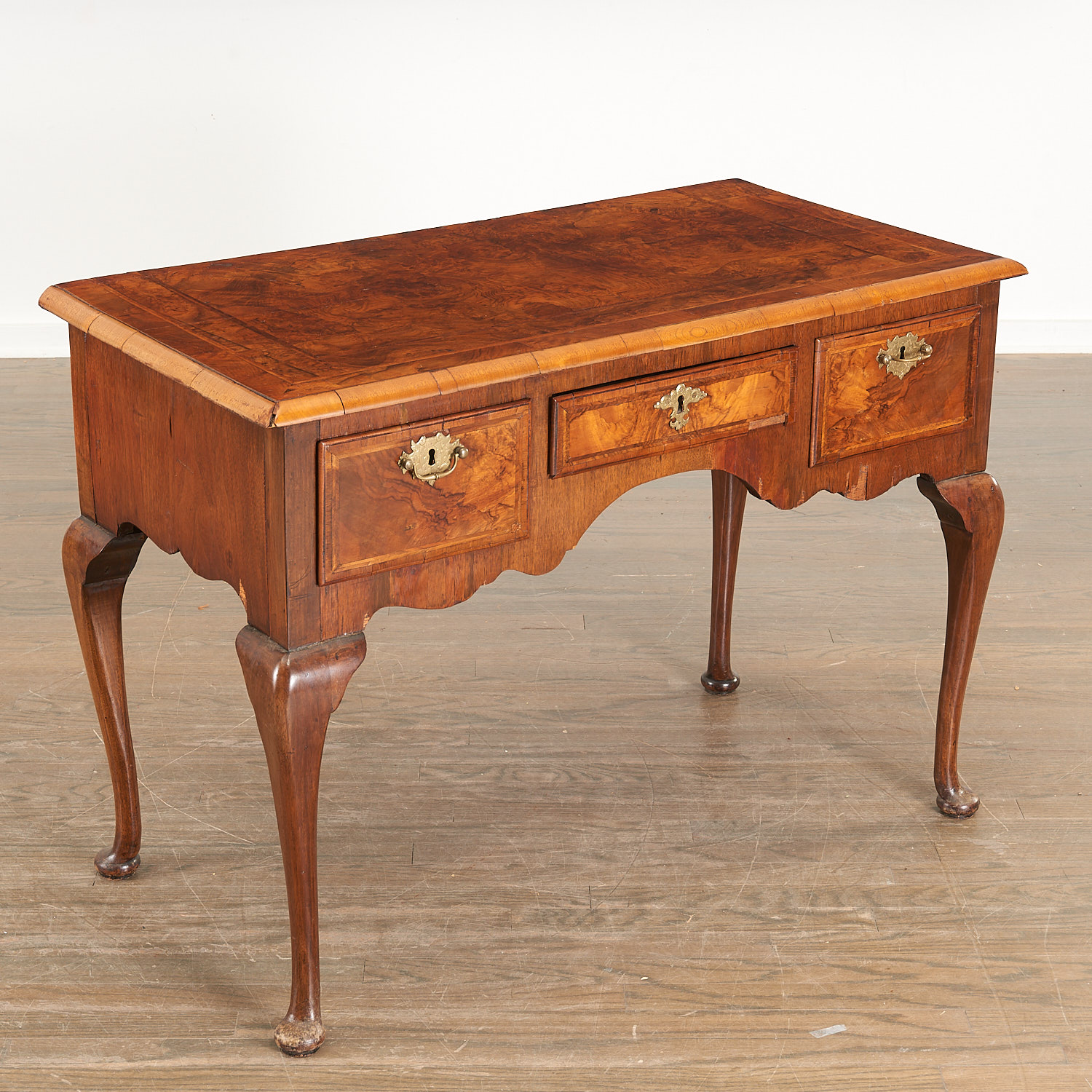 Appraisal: GEORGE II STYLE INLAID BURLWOOD DRESSING TABLE th c figured