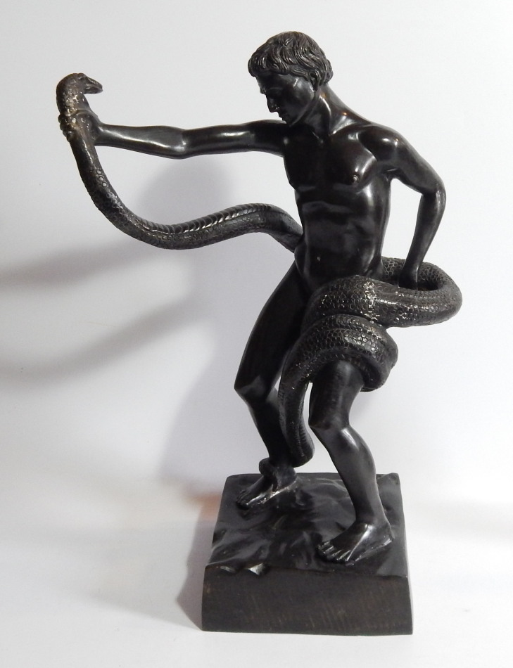 Appraisal: A bronze figure of a classical style nude male partially