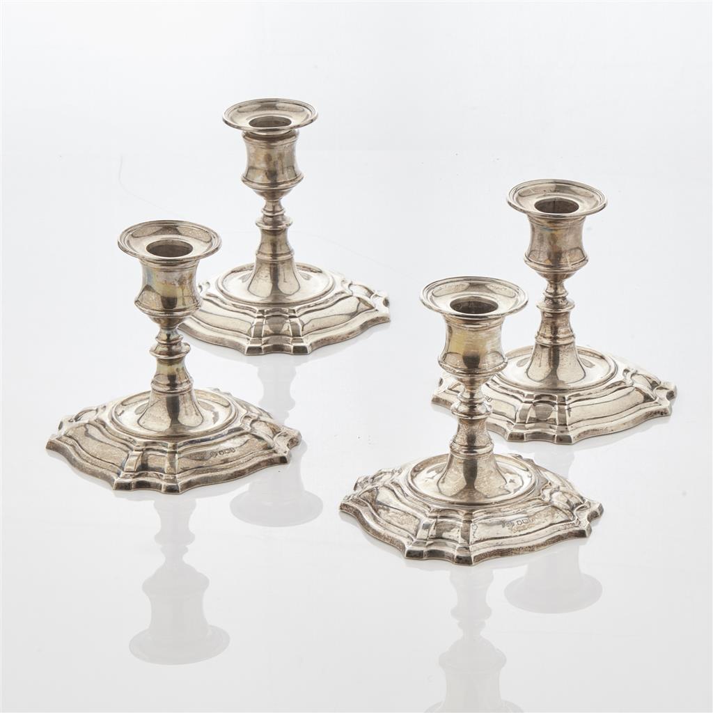 Appraisal: A set of four modern dwarf candlesticks W Hutton Sons