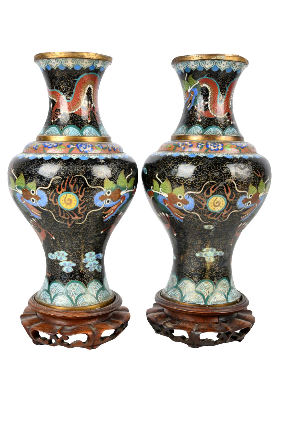 Appraisal: PAIR OF CLOISONNE DRAGON VASESeach on a wood base Provenance