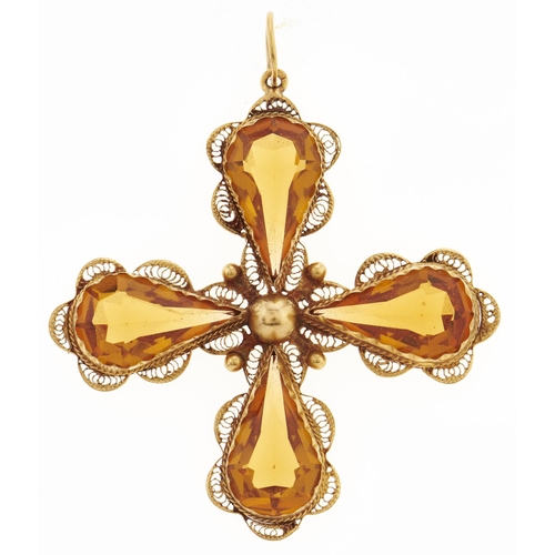 Appraisal: A citrine cruciform pendant with four pear shaped drops in