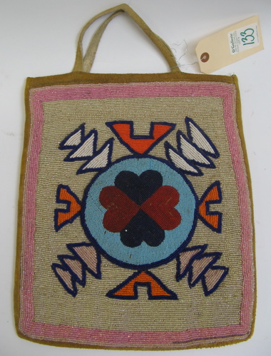 Appraisal: NEZ PERCE TRIBAL BEADED BAG geometric pattern in blues cranberry