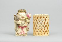 Appraisal: Carved Ivory Figurative Snuff Bottle Carved and painted ivory bottle