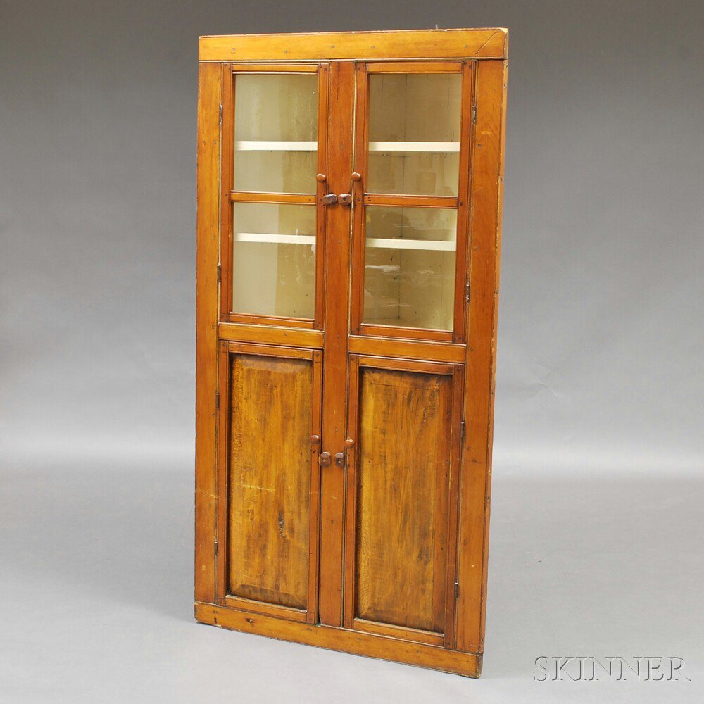 Appraisal: Country Pine Glazed Corner Cupboard America th century the two