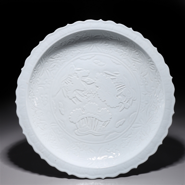 Appraisal: Chinese white glazed charger with incised floral designs to surface