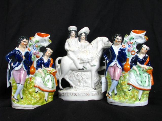 Appraisal: Three Staffordshire figural groupings including two matching vases depicting man