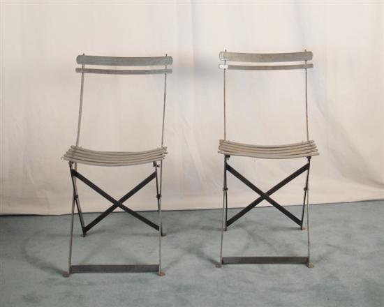 Appraisal: A Pair of French Folding Garden Chairs with curved metal