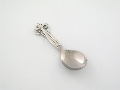 Appraisal: A modern Danish caddy spoon with a stainless steel blade